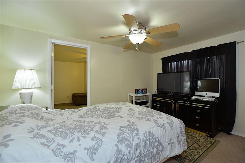 117 Landell Street Rochester, PA 15074 - Photo 11 of 19 Second bedroom with laundry room in rear.
