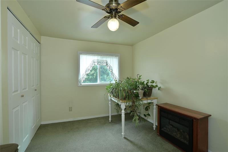 117 Landell Street Rochester, PA 15074 - Photo 13 of 19 Described as the laundry room (washer and dryer in the closet on left), this room is large and could be used as flexible space.