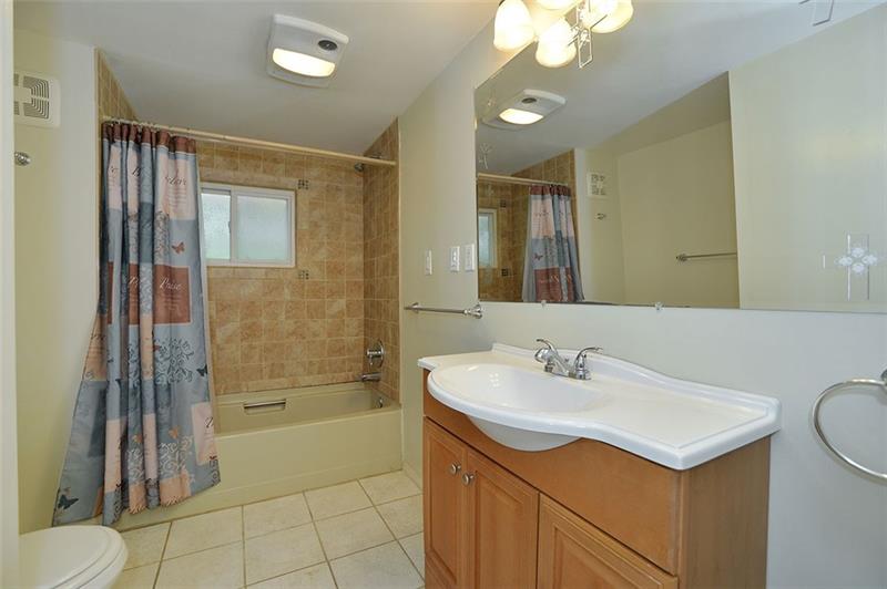 117 Landell Street Rochester, PA 15074 - Photo 14 of 19 Large full hall bath serves the second and third bedrooms.