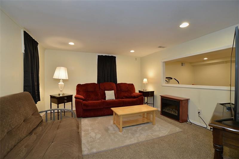 117 Landell Street Rochester, PA 15074 - Photo 15 of 19 Lower level consists of two large finished rooms and a THIRD full bath!