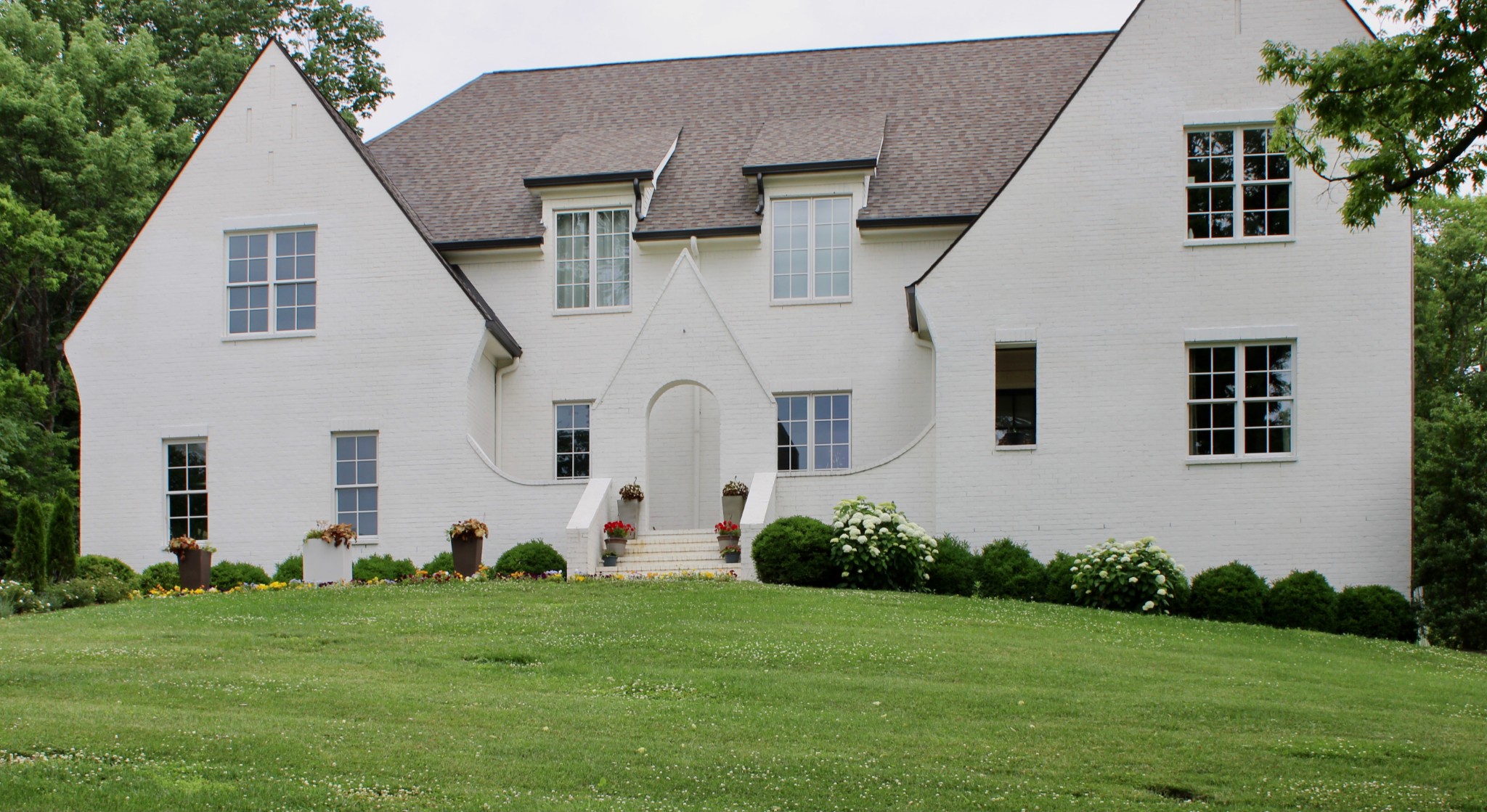 3520 Trimble Road Nashville, TN 37215 - Photo 2 of 44 a front view of a house with a garden