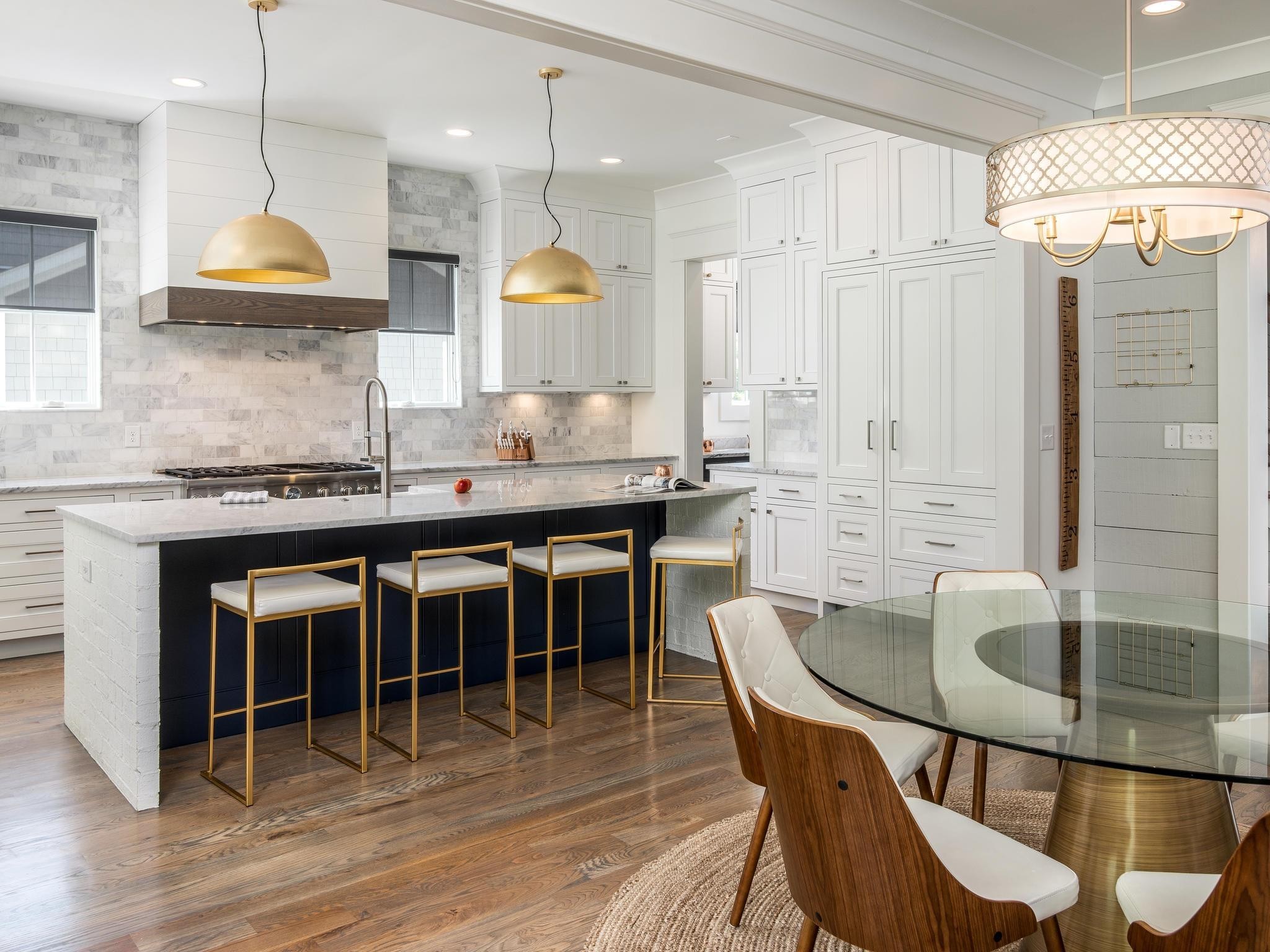 3520 Trimble Road Nashville, TN 37215 - Photo 11 of 44 a kitchen with granite countertop a table chairs sink and microwave