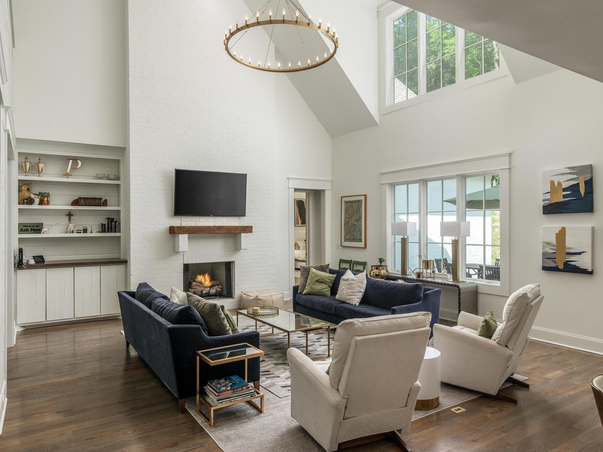 3520 Trimble Road Nashville, TN 37215 - Photo 15 of 44 a living room with furniture a fireplace and a flat screen tv