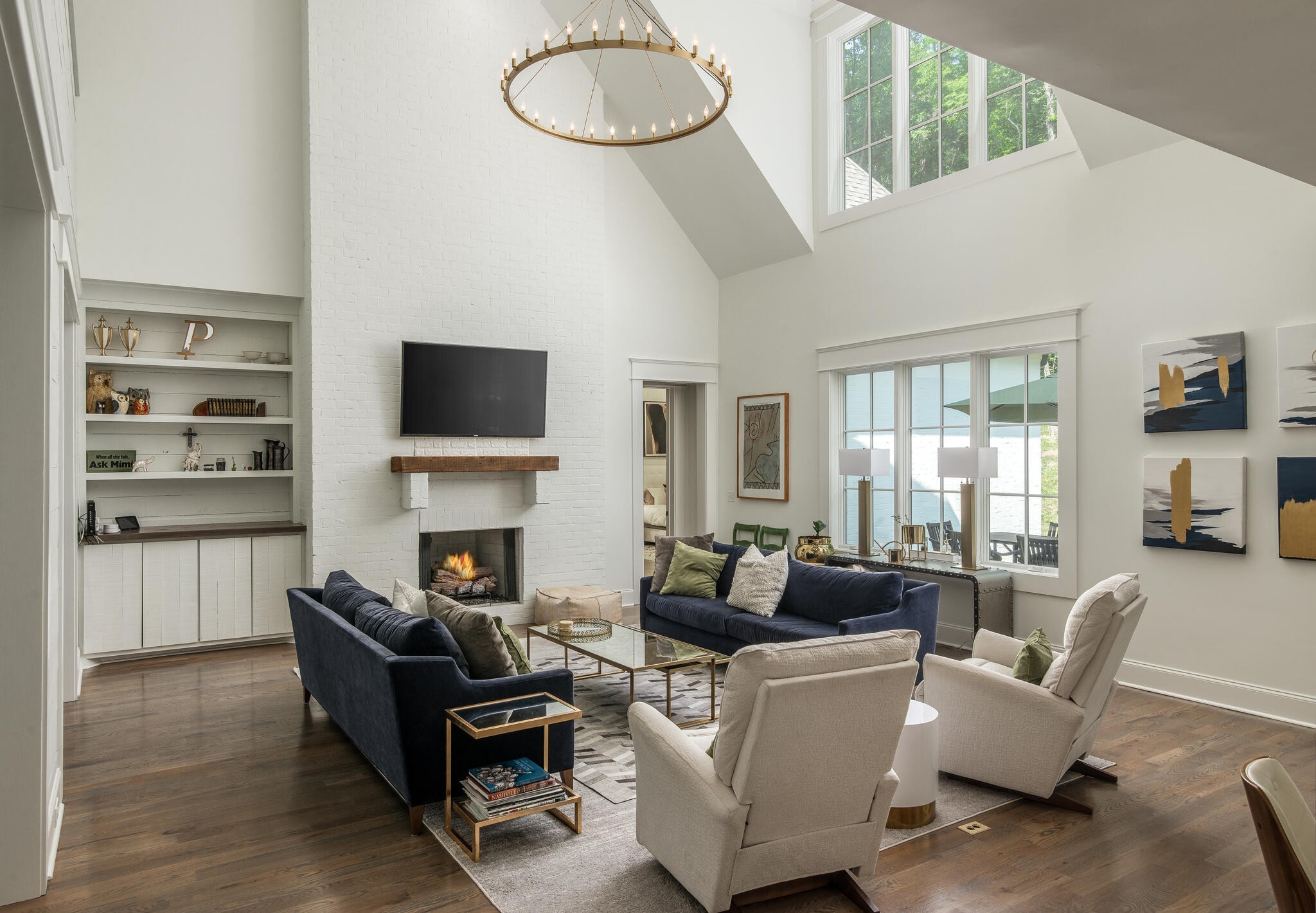 3520 Trimble Road Nashville, TN 37215 - Photo 18 of 44 a living room with furniture a fireplace and a flat screen tv