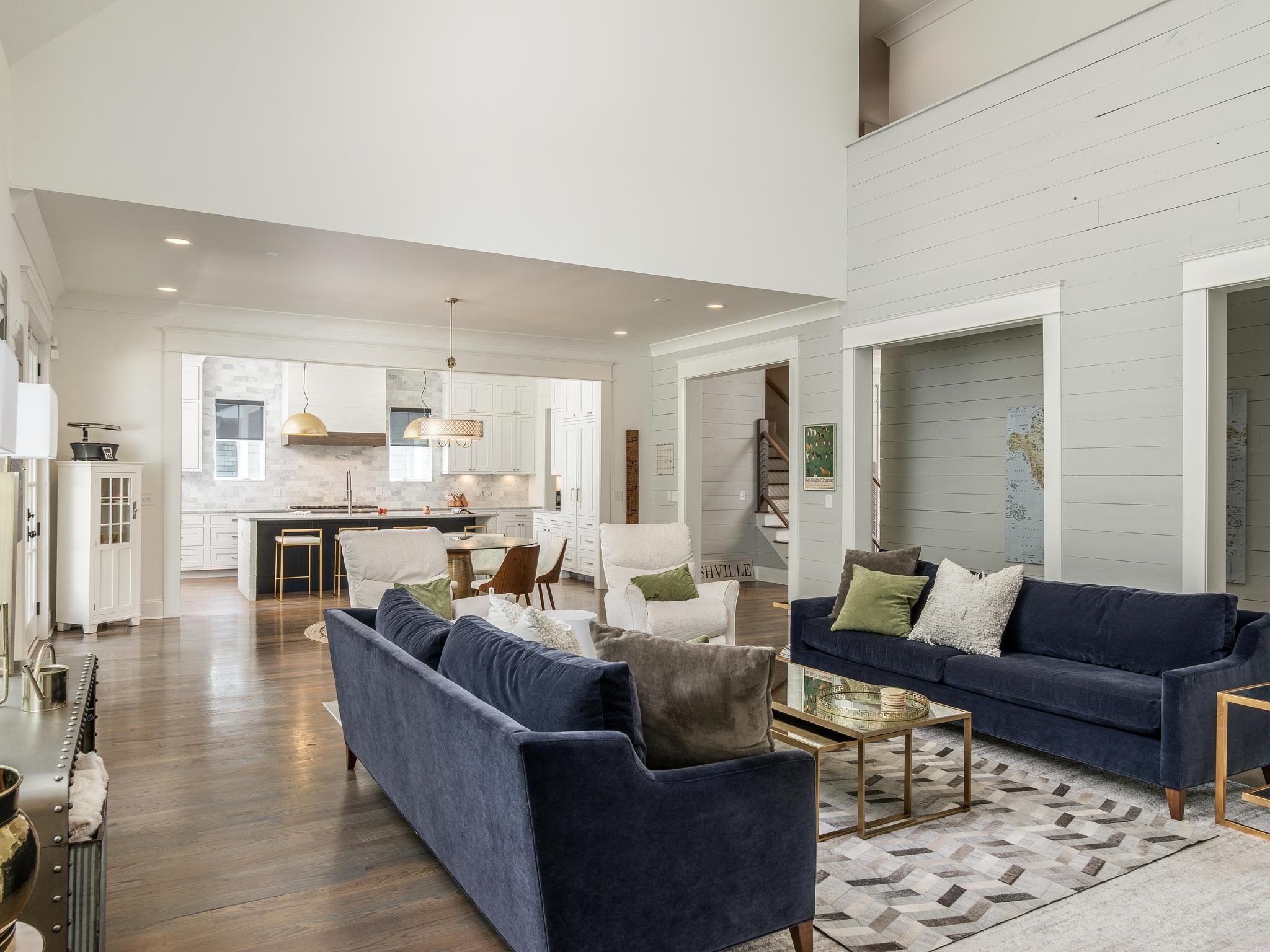 3520 Trimble Road Nashville, TN 37215 - Photo 19 of 44 a living room with furniture wooden floor and a kitchen view