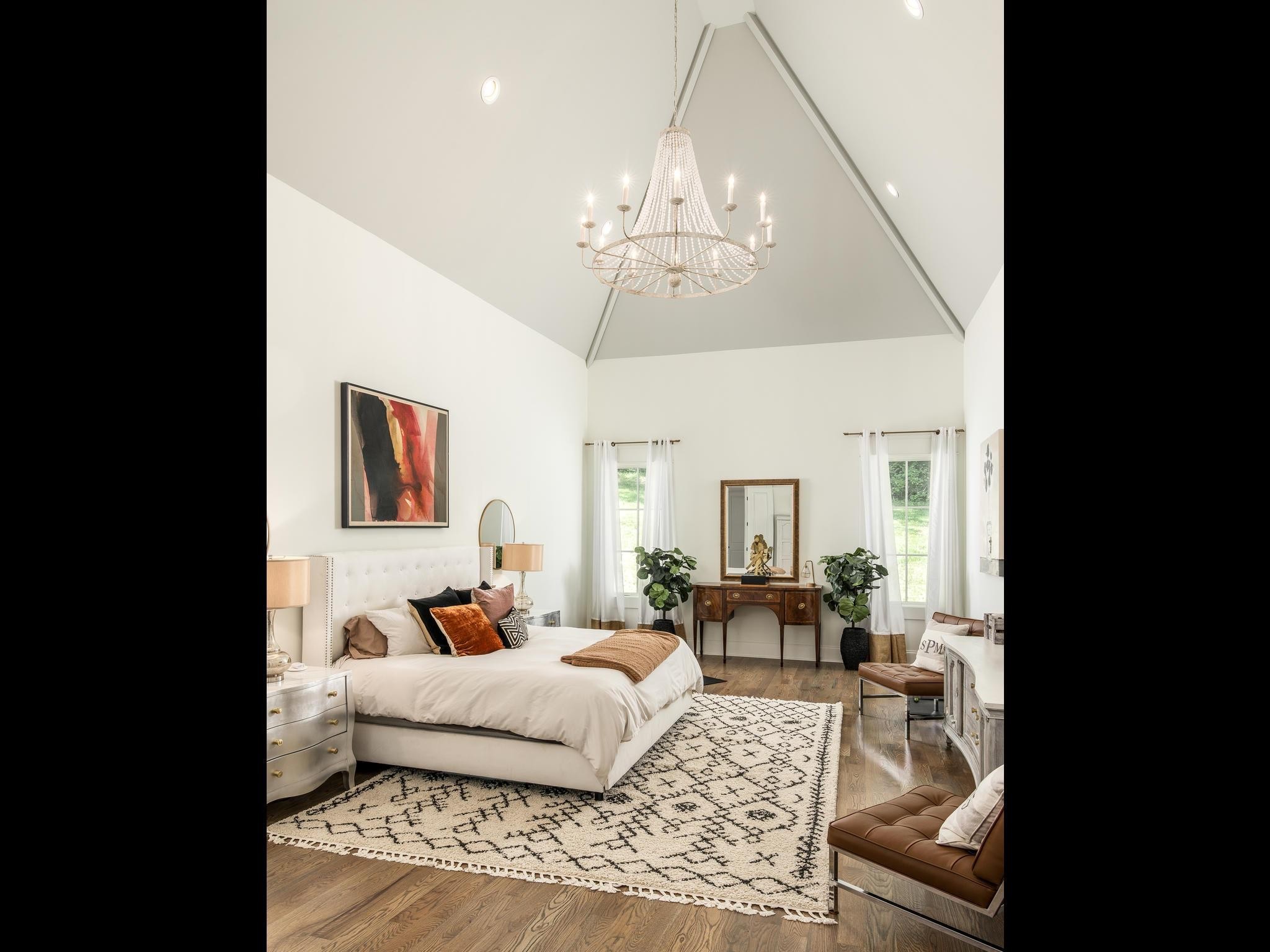 3520 Trimble Road Nashville, TN 37215 - Photo 21 of 44 a bedroom with furniture and a chandelier