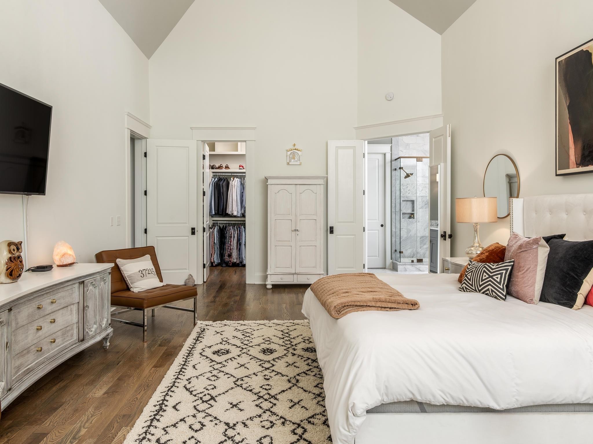 3520 Trimble Road Nashville, TN 37215 - Photo 23 of 44 a bedroom with a bed and a flat screen tv