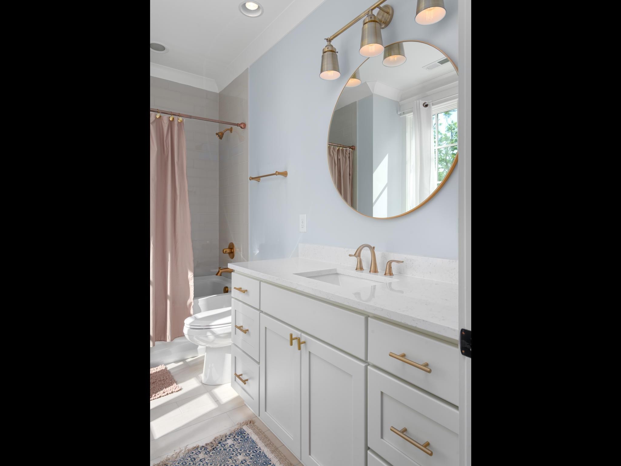 3520 Trimble Road Nashville, TN 37215 - Photo 32 of 44 a bathroom with a sink a vanity and a mirror