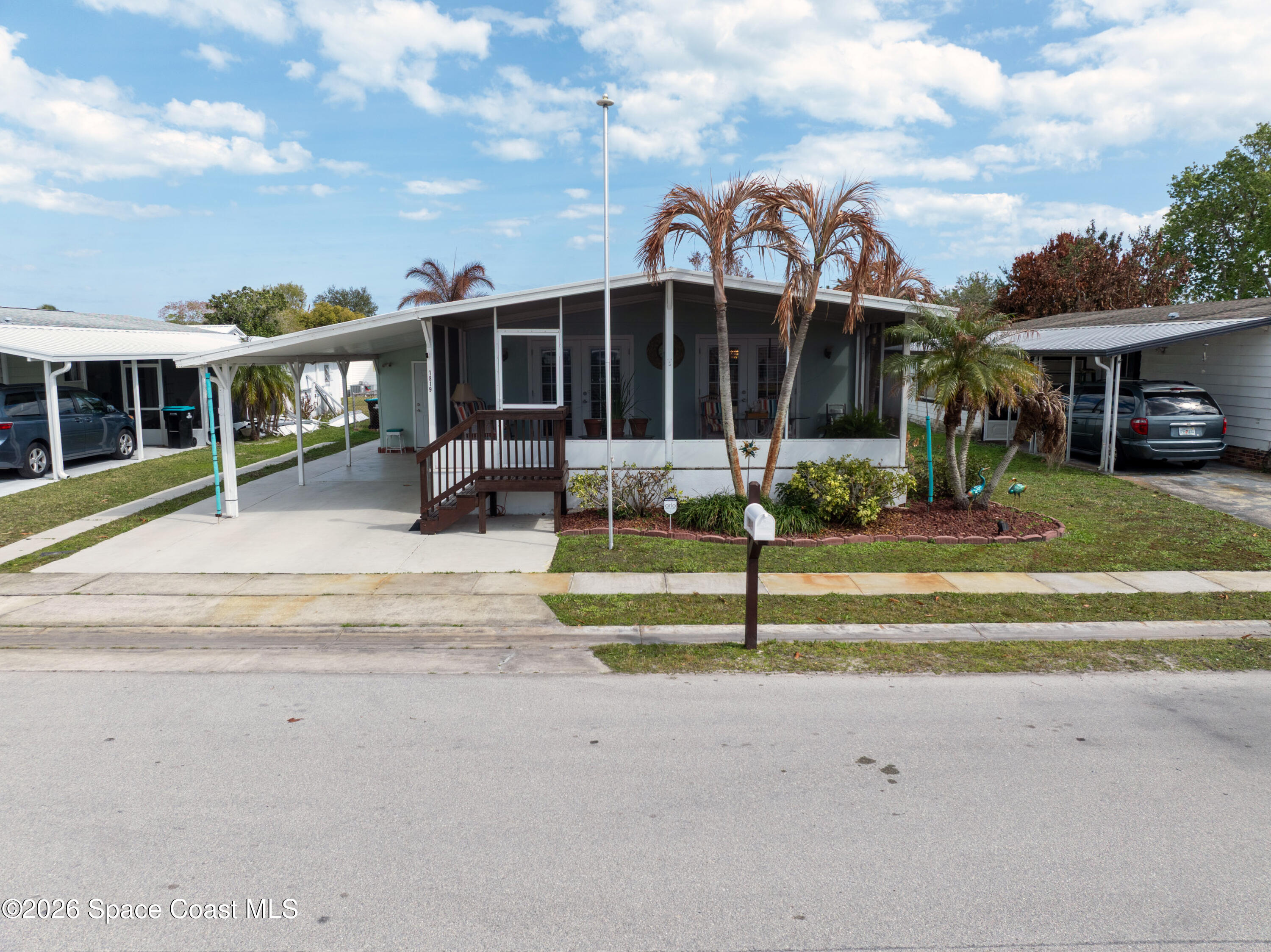 1819 Sago Palm Street Northeast Palm Bay, FL 32905 - Photo 1 of 35 front
