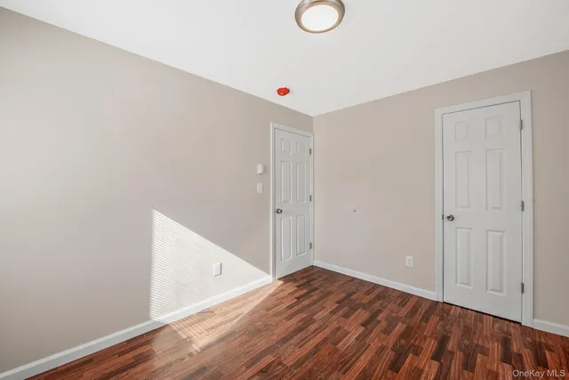 a very nice looking room with wooden floor