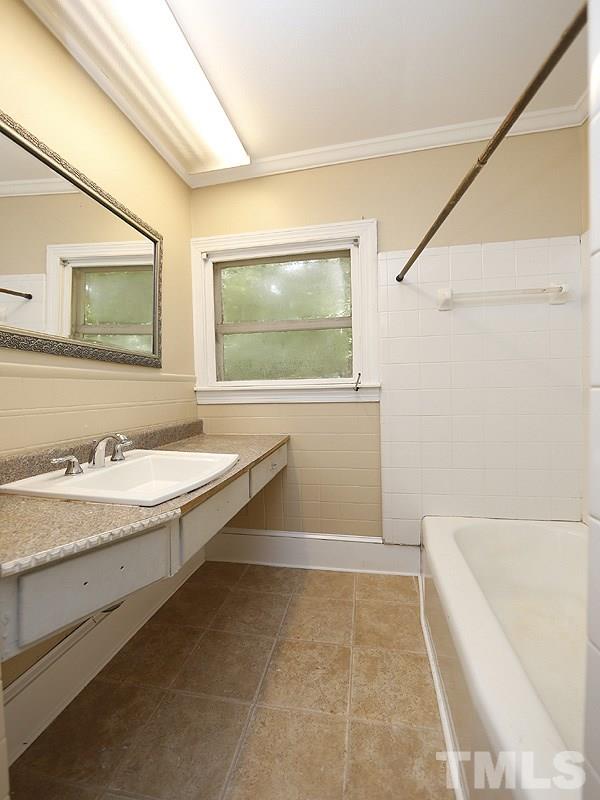 1303 Goodwin Road Durham, NC 27712 - Photo 8 of 12 New Vinyl flooring and Commode