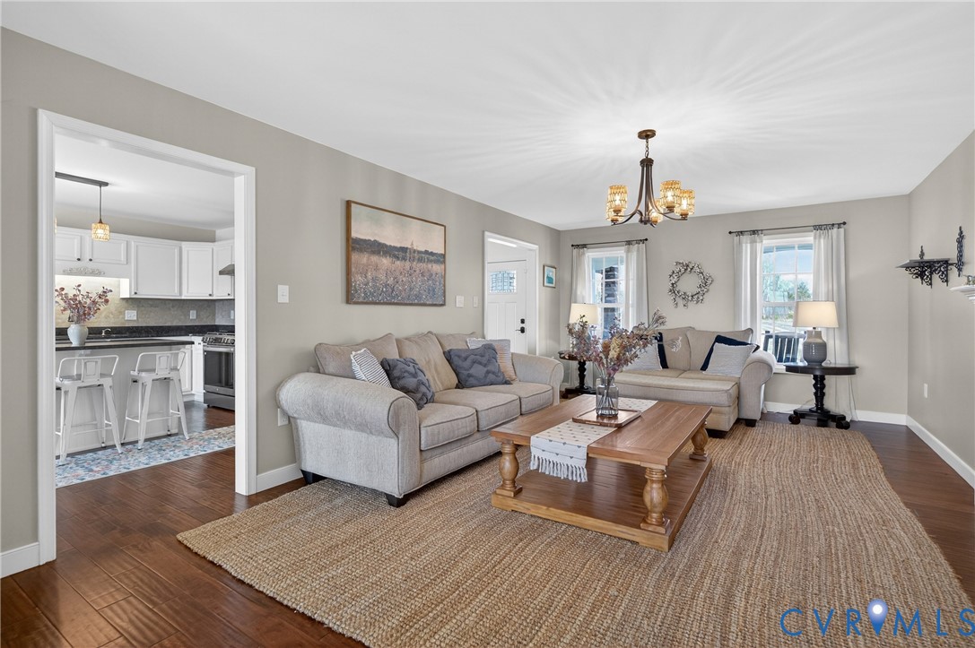 2092 Leigh Mountain Road Green Bay, VA 23942 - Photo 15 of 72 a living room with furniture and a chandelier