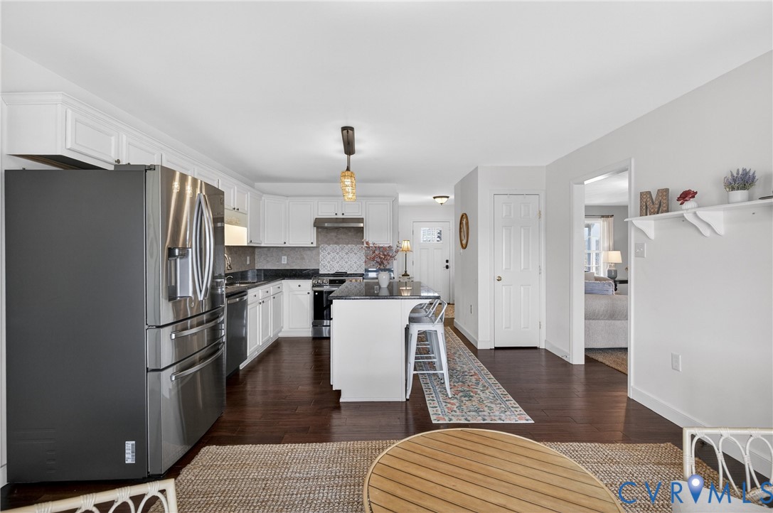 2092 Leigh Mountain Road Green Bay, VA 23942 - Photo 21 of 72 a kitchen with a refrigerator and a sink