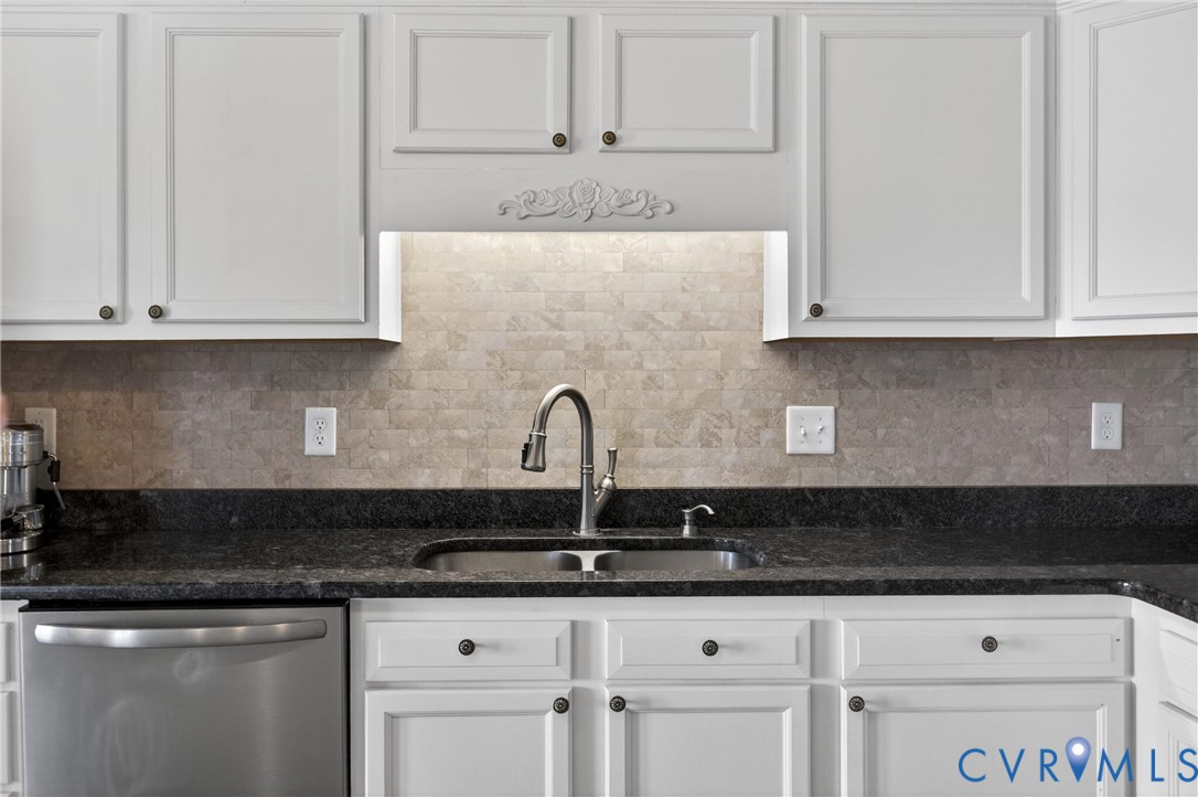 2092 Leigh Mountain Road Green Bay, VA 23942 - Photo 23 of 72 a kitchen with granite countertop white cabinets and a sink