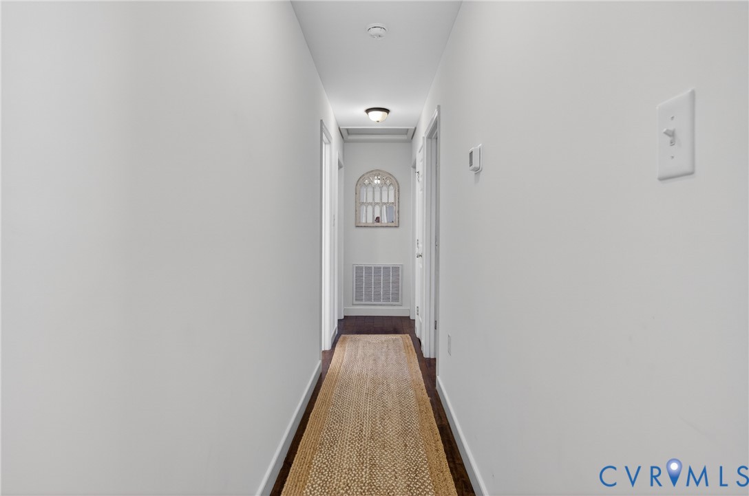 2092 Leigh Mountain Road Green Bay, VA 23942 - Photo 28 of 72 a view of a hallway with wooden floor and a front door