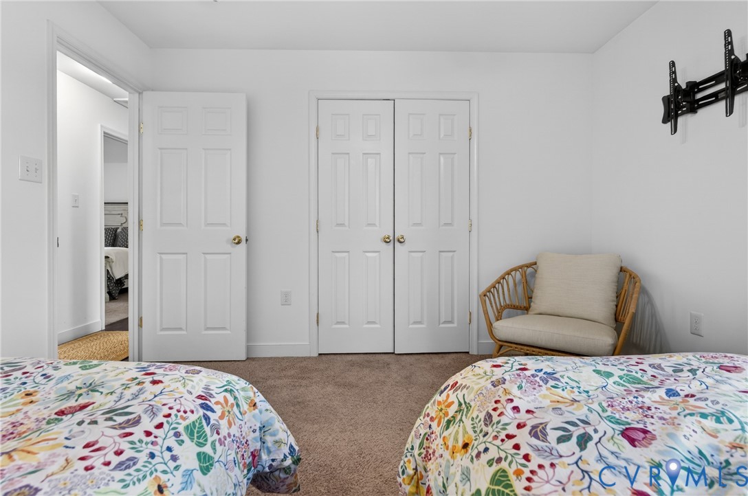 2092 Leigh Mountain Road Green Bay, VA 23942 - Photo 32 of 72 a bedroom with a bed and hallway