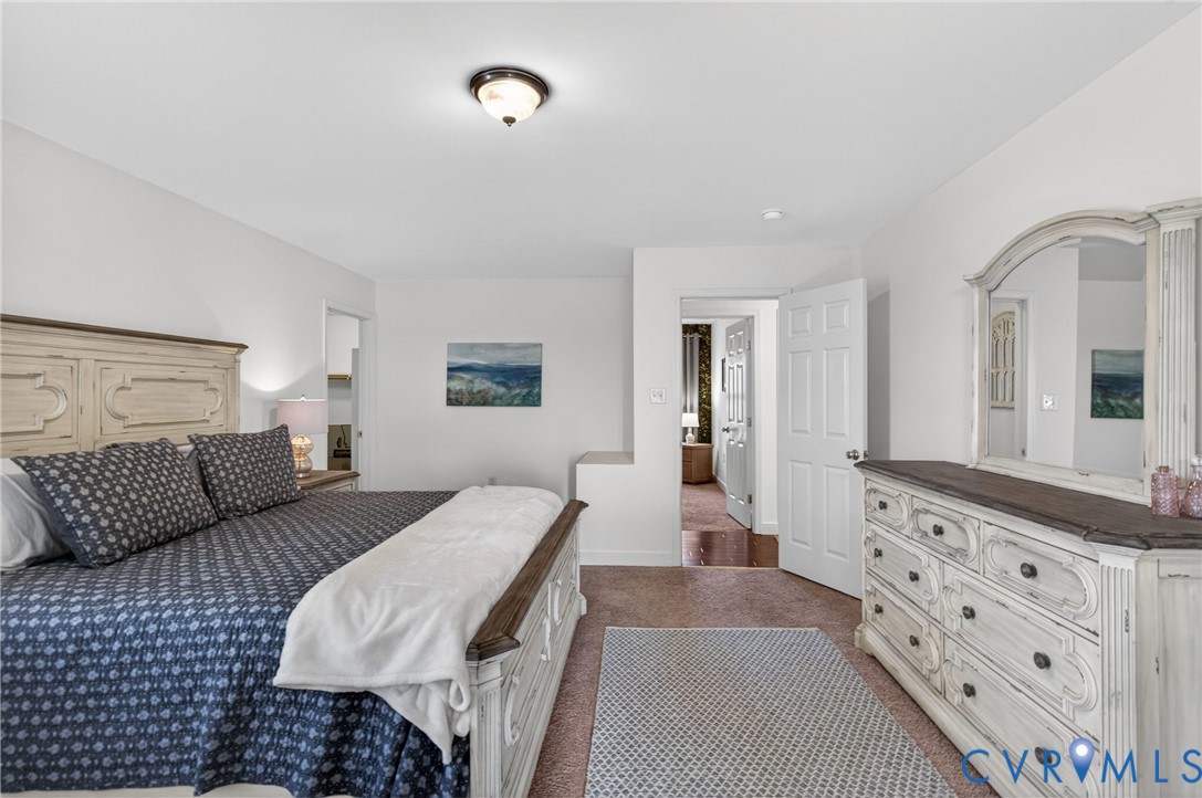 2092 Leigh Mountain Road Green Bay, VA 23942 - Photo 36 of 72 a bedroom with double bed and a couch