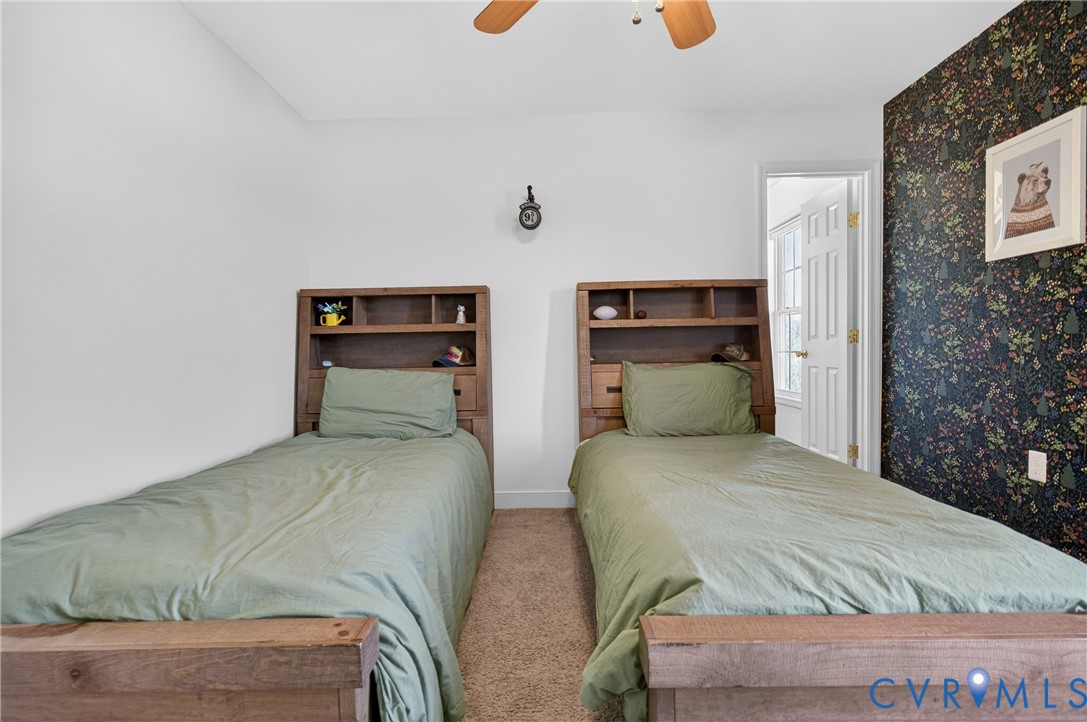 2092 Leigh Mountain Road Green Bay, VA 23942 - Photo 42 of 72 a bedroom with two beds and potted plant