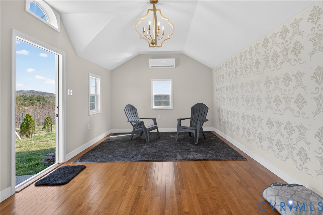 2092 Leigh Mountain Road Green Bay, VA 23942 - Photo 47 of 72 a living room with furniture rug and a window