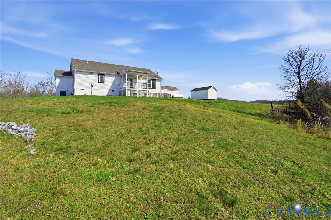 2092 Leigh Mountain Road Green Bay, VA 23942 - Photo 61 of 72 a house view with a garden space