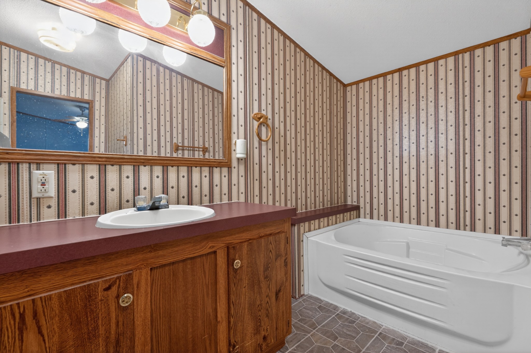 228 Shasteen Ridge Road Lynchburg, TN 37352 - Photo 12 of 53 a bathroom with a sink and a bathtub