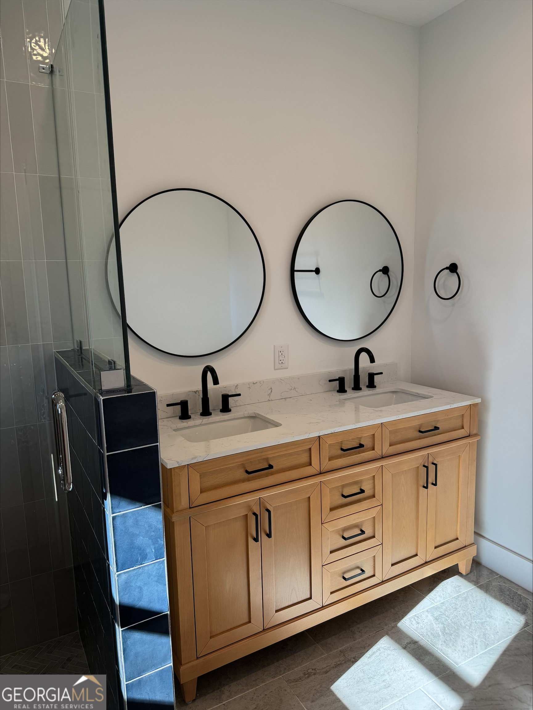 1705 Old Northcutt Road, Unit TR A Ellijay, GA 30536 - Photo 12 of 29 a bathroom with a double vanity sink and a mirror