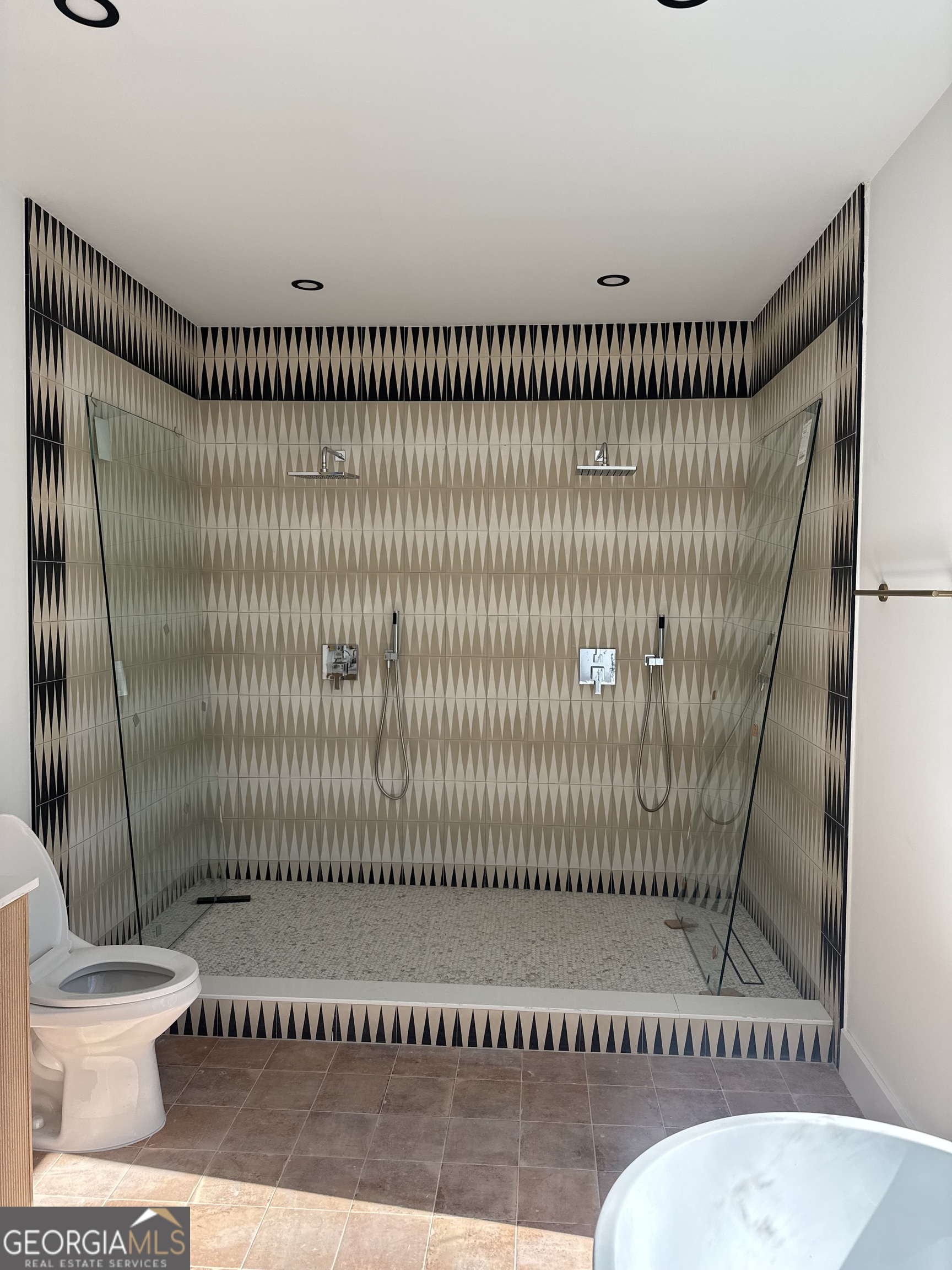 1705 Old Northcutt Road, Unit TR A Ellijay, GA 30536 - Photo 14 of 29 a bathroom with a toilet and a shower