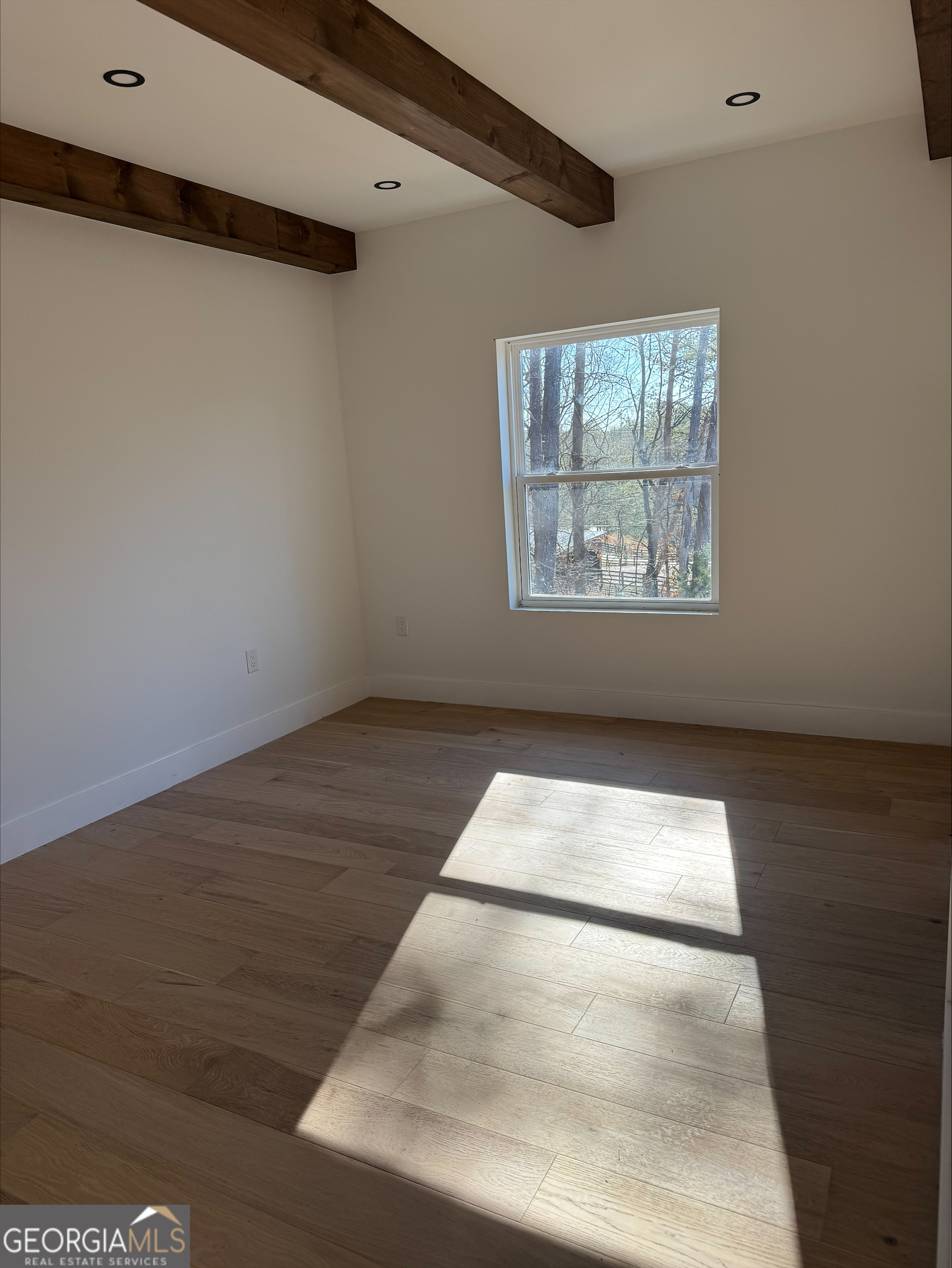 1705 Old Northcutt Road, Unit TR A Ellijay, GA 30536 - Photo 21 of 29 a view of wooden floor and utility in a room