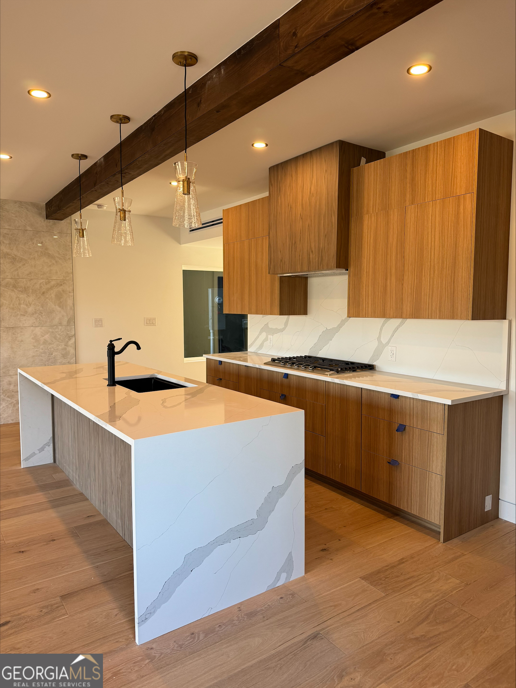 1705 Old Northcutt Road, Unit TR A Ellijay, GA 30536 - Photo 4 of 29 a kitchen with stainless steel appliances kitchen island a sink stove and cabinets
