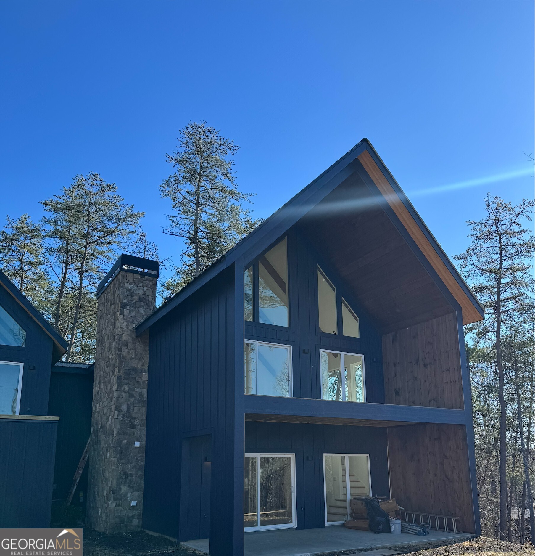 1705 Old Northcutt Road, Unit TR A Ellijay, GA 30536 - Photo 7 of 29 a tall brick building with a large windows