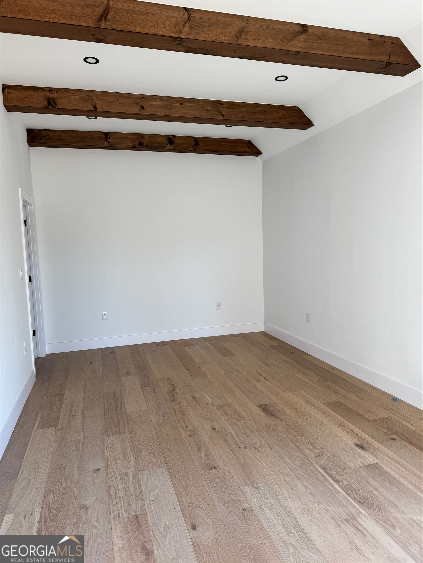 1705 Old Northcutt Road, Unit TR A Ellijay, GA 30536 - Photo 9 of 29 a view of a utility room with wooden floor