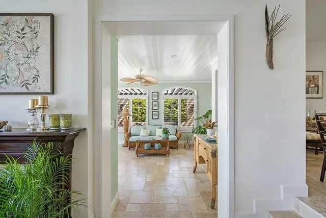 a bedroom with furniture and wooden floor