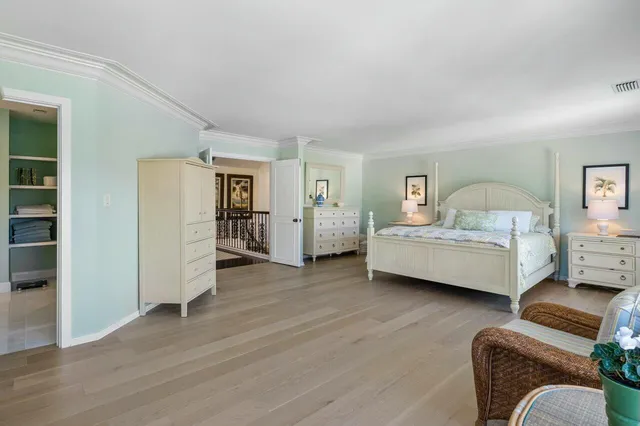 a spacious bathroom with a sink double vanity and a mirror