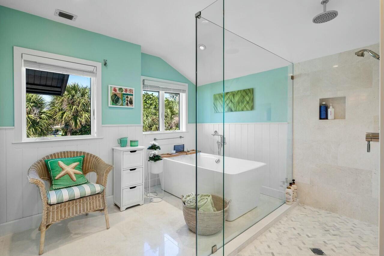 6549 Southeast South Marina Way Stuart, FL 34996 - Photo 27 of 76 a living room with furniture and a flat screen tv