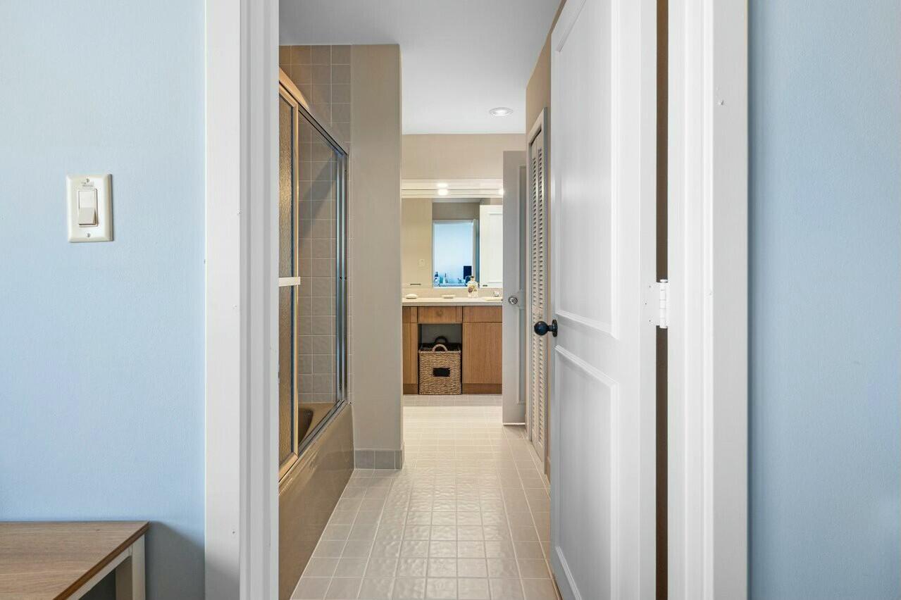 6549 Southeast South Marina Way Stuart, FL 34996 - Photo 38 of 76 a view of a hallway with a livingroom and furniture