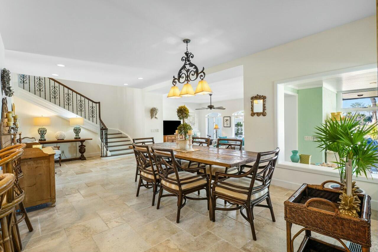 6549 Southeast South Marina Way Stuart, FL 34996 - Photo 5 of 76 a view of a dining room with furniture