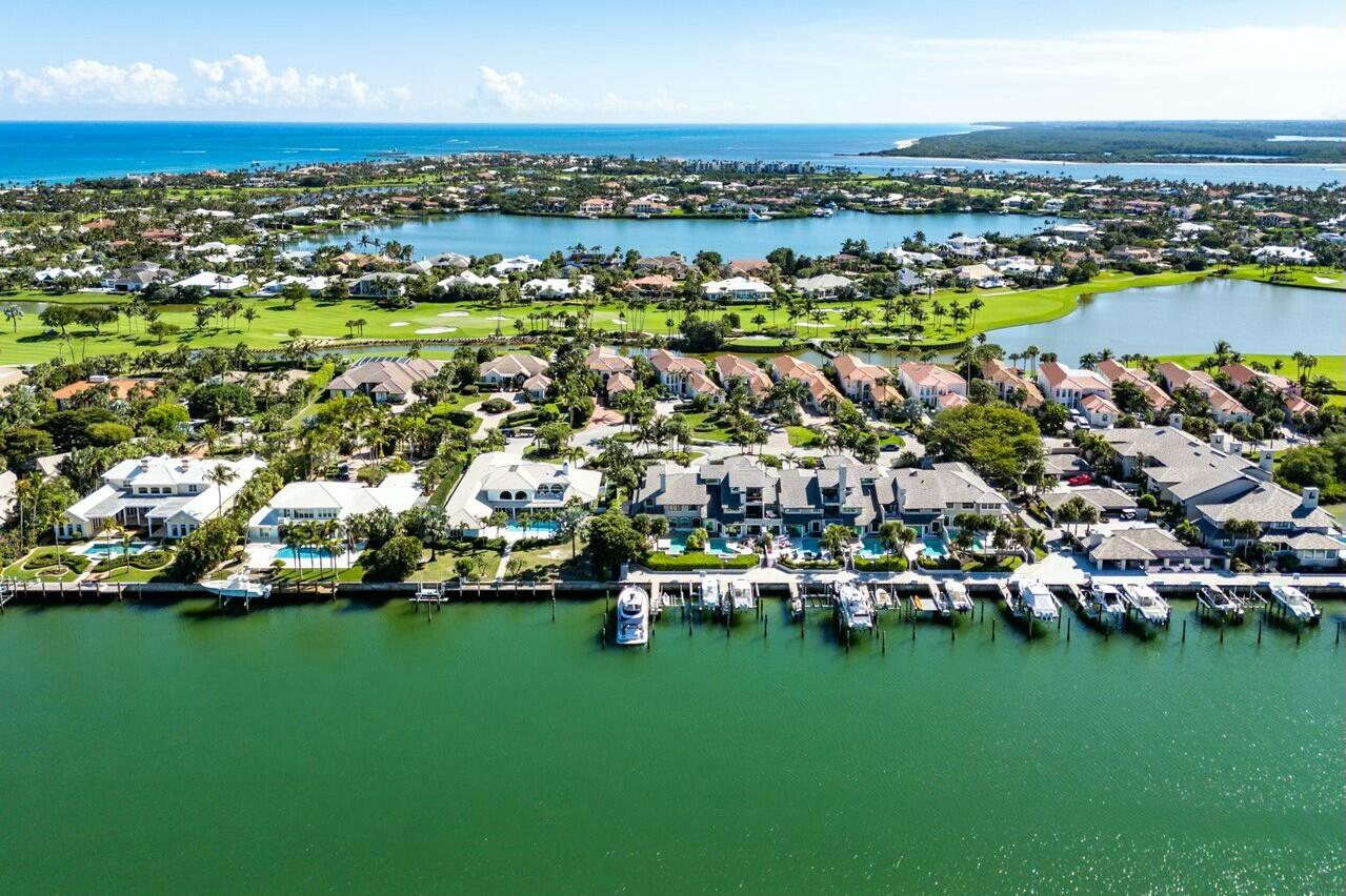 6549 Southeast South Marina Way Stuart, FL 34996 - Photo 74 of 76 an aerial view of multiple house with a lake view
