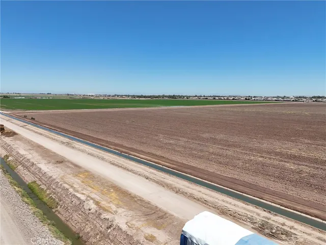 a view of a balcony next to a lake