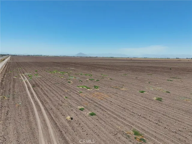 an aerial view of beach and ocean