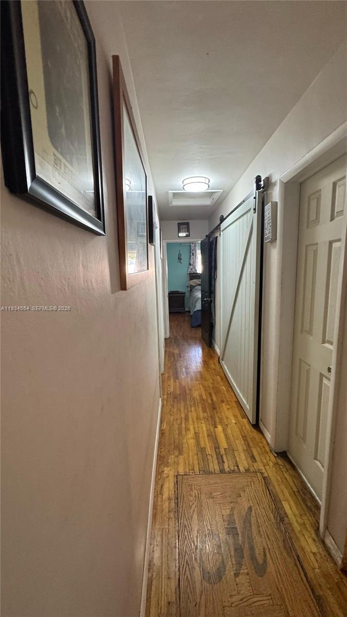 630 Northeast 165th Street Miami, FL 33162 - Photo 20 of 36 Hallway to bedrooms