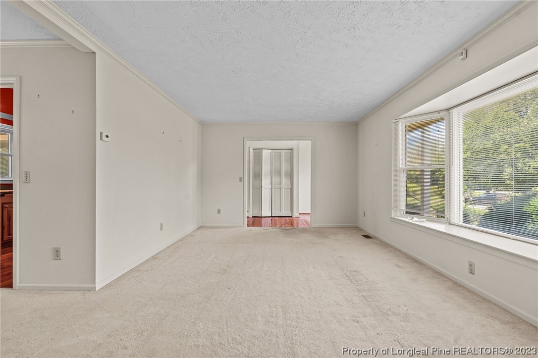 1812 Bainbridge Road Stedman, NC 28391 - Photo 12 of 30 a view of an empty room with a window
