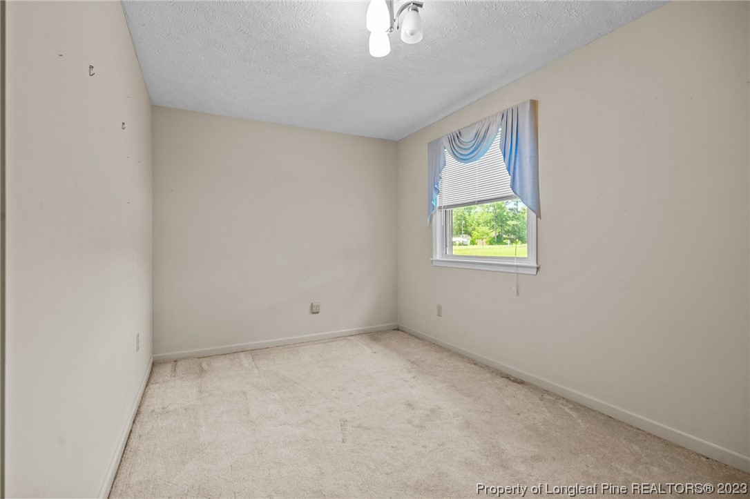 1812 Bainbridge Road Stedman, NC 28391 - Photo 14 of 30 an empty room with windows
