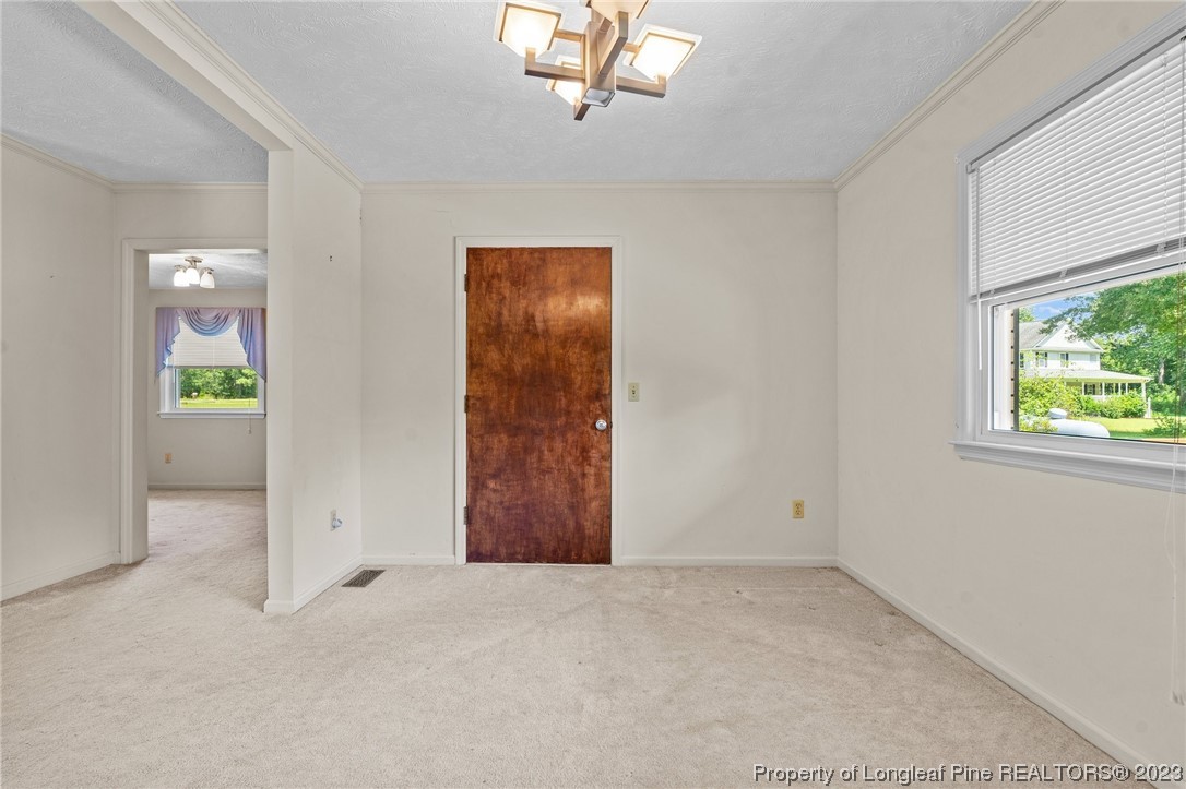 1812 Bainbridge Road Stedman, NC 28391 - Photo 15 of 30 an empty room with windows and closet