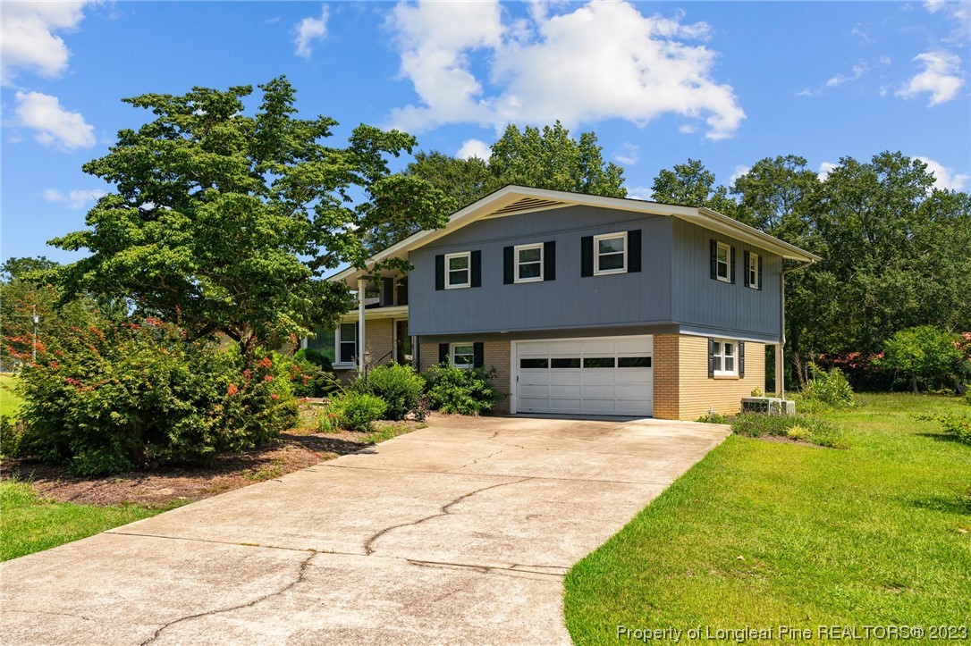 1812 Bainbridge Road Stedman, NC 28391 - Photo 26 of 30 a front view of a house with a yard