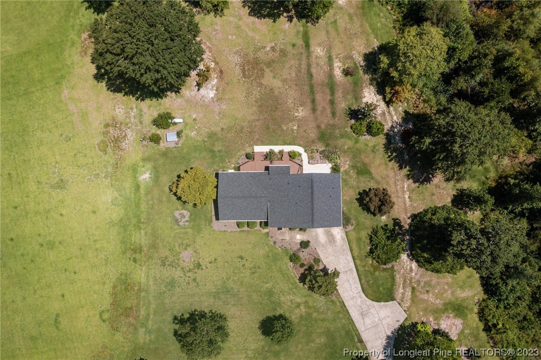 1812 Bainbridge Road Stedman, NC 28391 - Photo 7 of 30 an aerial view of a house with a yard