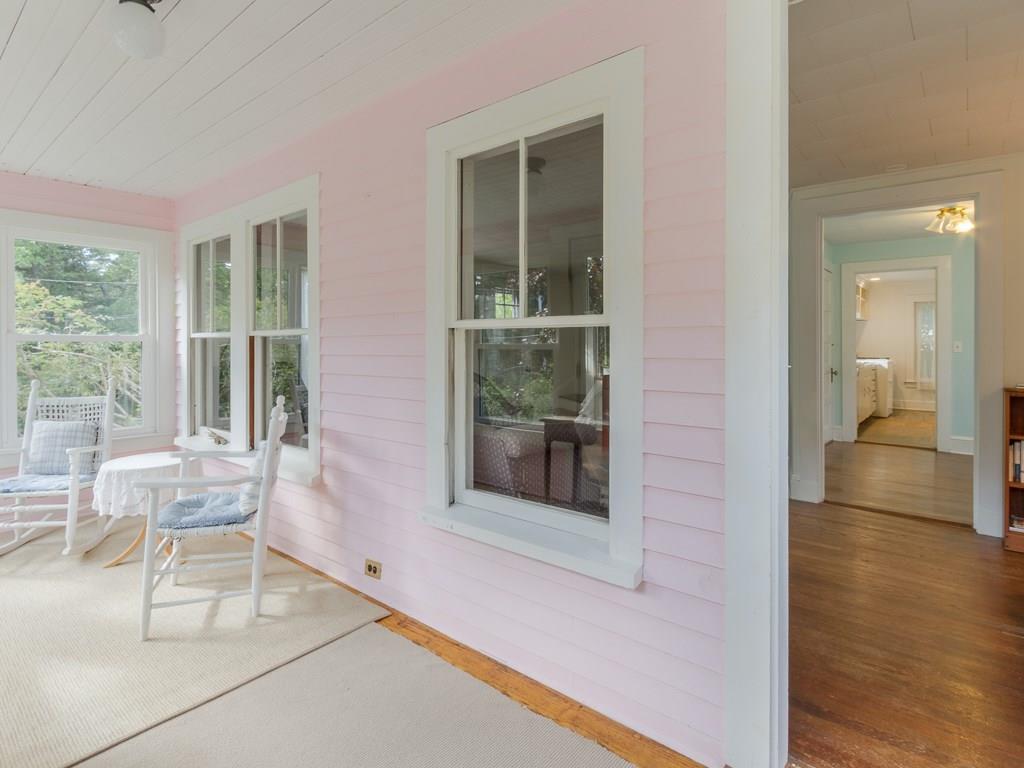 29 Jordan Pond Road Seal Harbor, ME 04675 - Photo 9 of 25 The sunroom opens into the living room.