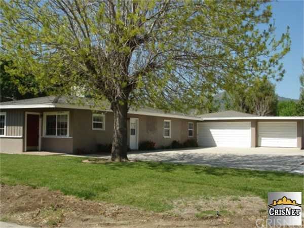 25041 Wiley Canyon Road Newhall, CA 91321 - Photo 1 of 1 front view of a house with a yard