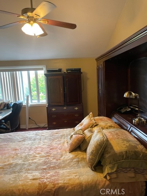 11918 Heritage Circle Downey, CA 90241 - Photo 6 of 21 a bedroom with a bed and a television