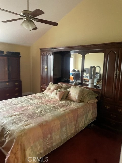 11918 Heritage Circle Downey, CA 90241 - Photo 10 of 21 a bedroom with a bed ceiling fan and a window