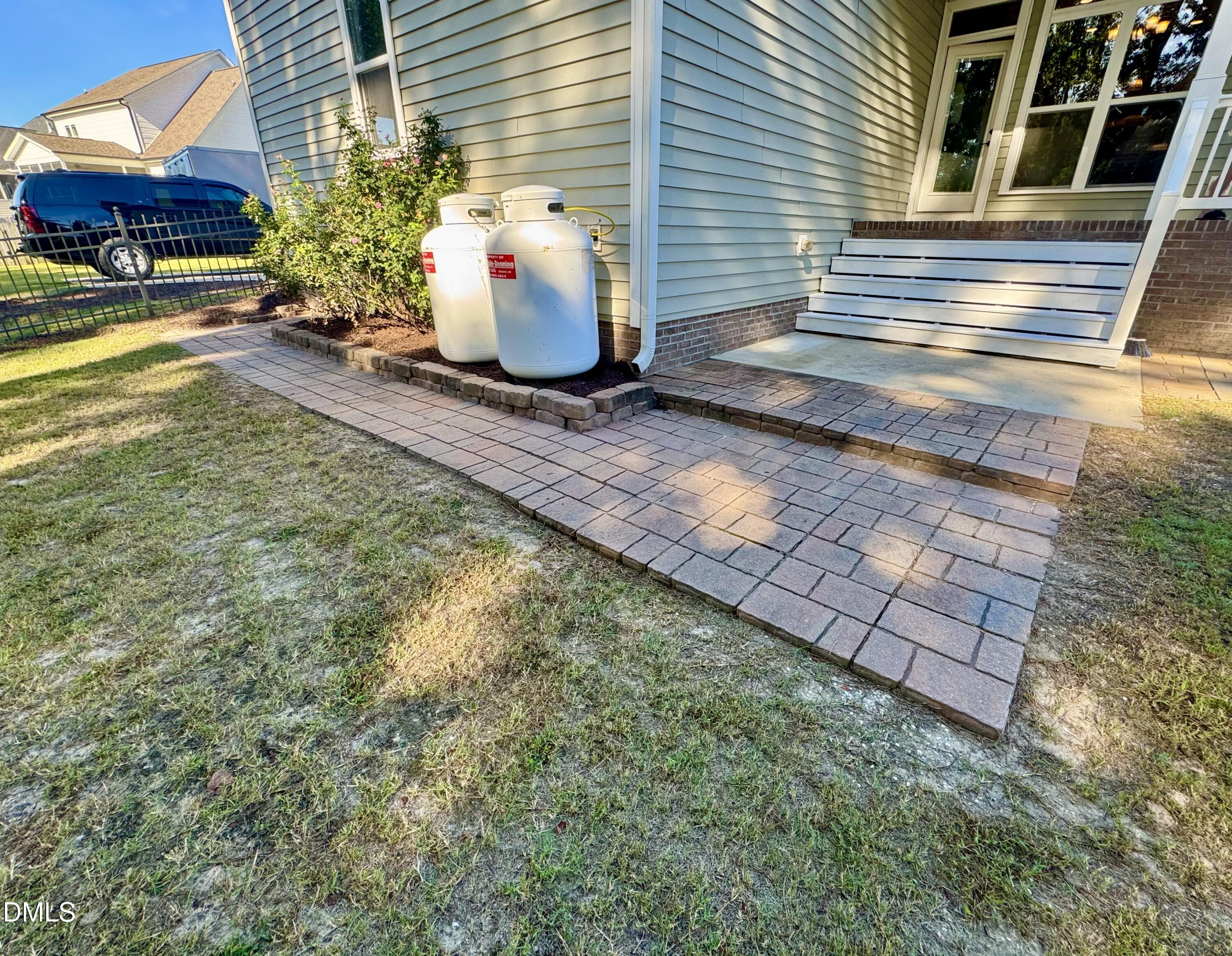 136 Kenneth Lane Willow Spring, NC 27592 - Photo 62 of 94 Paver patio for grilling
